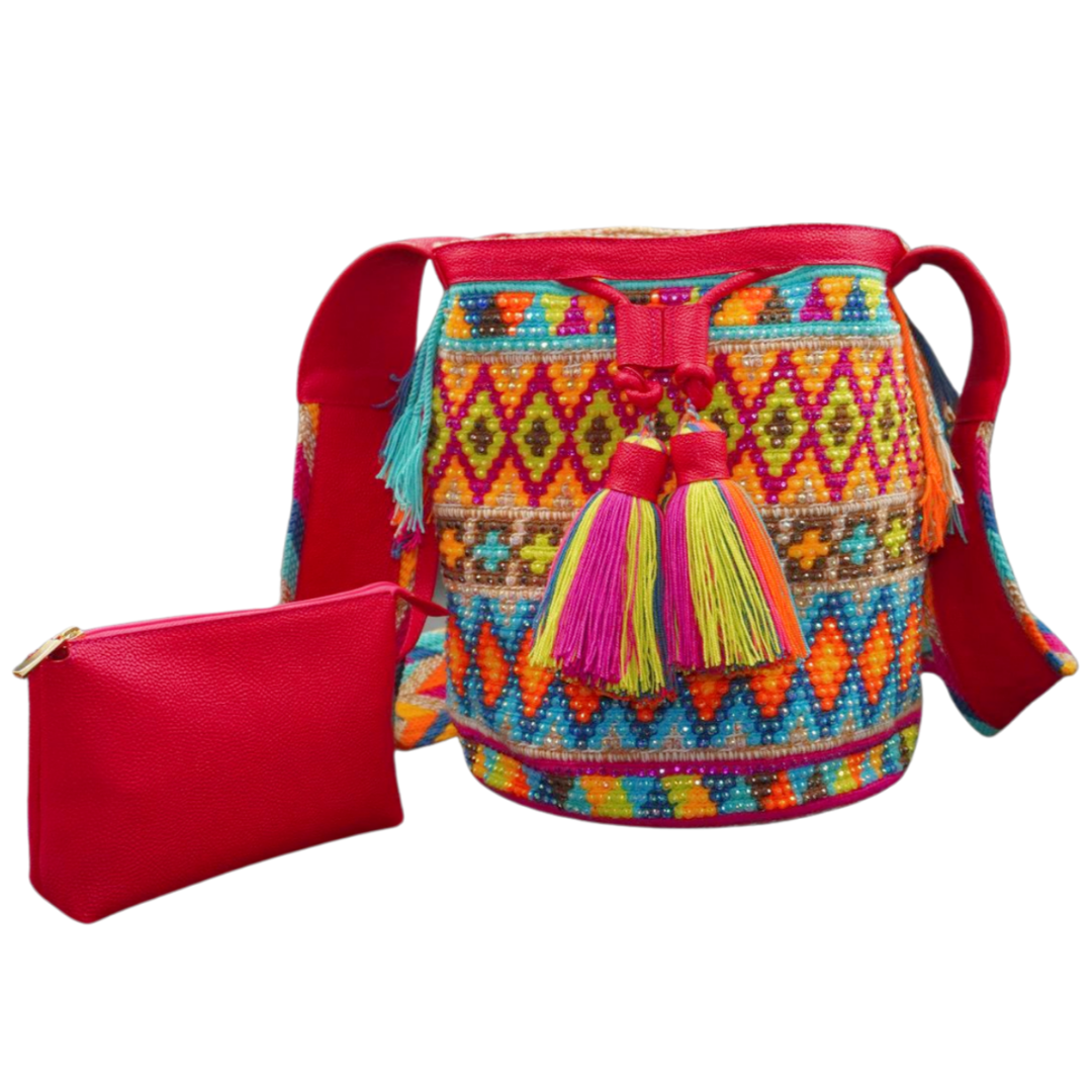 Pink Leather Wayuu Bag with Diamond Gem Pattern. The mochila also has 2 tassels and a smaller leather bag / compartment attached