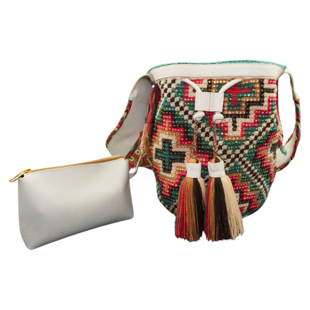 White Leather Wayuu Bag with Multicoloured Gems and two tassels. The mochila has a cross shaped pattern and it has a smaller white leather bag / compartment attached to the bag