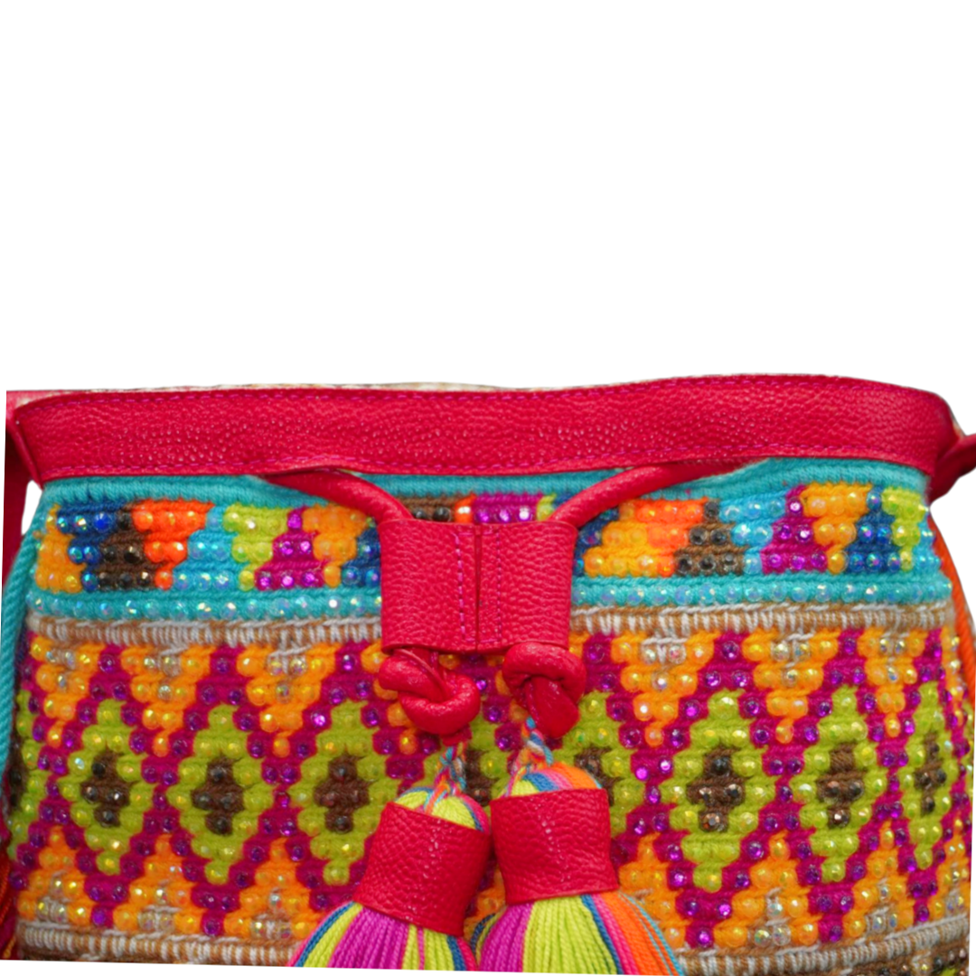 Pink Leather Wayuu Bag with Diamond Gem Pattern. The mochila also has 2 tassels and a smaller leather bag / compartment attached