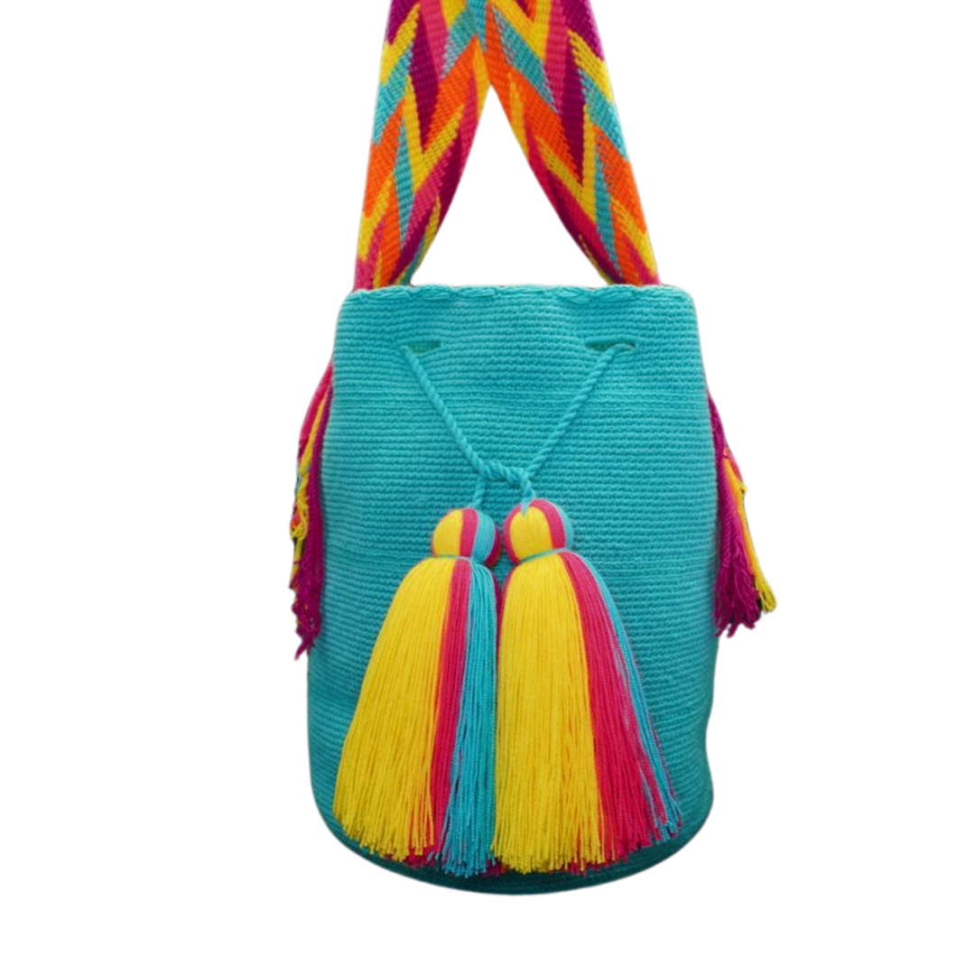 A handmade Danko bag in vibrant aqua, featuring two tassels and a multi-coloured strap. This crochet bag can be worn as a side bag or a crossbody bag
